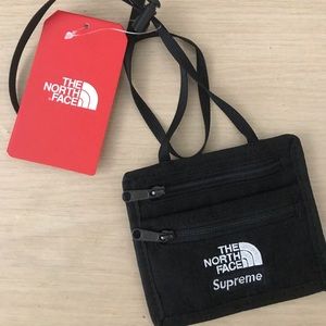 The North Face/Supreme collab travel wallet